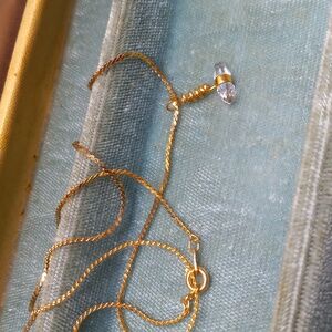 Gold tone necklace crystal pendant on chain